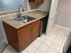 The kitchen features a stainless steel sink with granite countertops, and stainless appliances at 11538 Westwood Blvd # 226, Orlando, FL 32821