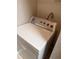 Close-up of the white top-load dryer featuring multiple settings and power to start at 11538 Westwood Blvd # 226, Orlando, FL 32821