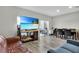 Open concept dining area with hardwood floors and access to patio at 12067 White Wave Pt, Orlando, FL 32828