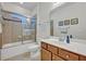 Clean bathroom with a shower/tub combo and modern vanity at 124 Adler Pt, Oviedo, FL 32765