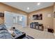Home theater with comfortable seating and entertainment center at 124 Adler Pt, Oviedo, FL 32765
