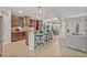Modern kitchen with stainless steel appliances and an island with seating at 124 Adler Pt, Oviedo, FL 32765