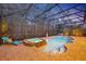 Beautiful screened pool and spa with lounge chairs at 124 Adler Pt, Oviedo, FL 32765