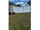 White vinyl fence encloses the backyard at 1315 Blackwater Pond W Dr, Orlando, FL 32828