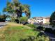 Exterior view of the community building with landscaping at 155 N Pearl Lake Cswy # 200, Altamonte Springs, FL 32714