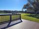 Spacious lakefront deck overlooks a peaceful lake with lush landscaping at 155 N Pearl Lake Cswy # 200, Altamonte Springs, FL 32714