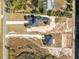 Aerial view of two houses and surrounding land at 20344 Sheldon St, Orlando, FL 32833
