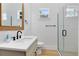 Modern bathroom with a large shower and vanity at 20344 Sheldon St, Orlando, FL 32833