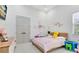 bedroom with full bed, playful decor, and plenty of natural light at 20344 Sheldon St, Orlando, FL 32833