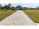 Two-story home with paver driveway and landscaping at 20344 Sheldon St, Orlando, FL 32833