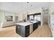 Modern kitchen island with quartz countertop and stainless steel appliances at 20344 Sheldon St, Orlando, FL 32833