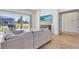 Living area featuring a sectional sofa and sliding glass doors at 20344 Sheldon St, Orlando, FL 32833