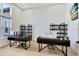 Bright home office with two desks, ample shelving, and large windows at 20344 Sheldon St, Orlando, FL 32833