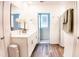 Modern bathroom with double vanity and shower at 236 Talisi Loop, St Cloud, FL 34771