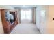 Living room with large TV and built-in shelving at 236 Talisi Loop, St Cloud, FL 34771