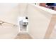 Stairs leading down to the kitchen with island at 236 Talisi Loop, St Cloud, FL 34771