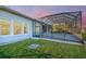 Home with screened patio and fenced backyard at 2423 Hyatt Creek Ln, Port Orange, FL 32128