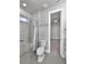 Bathroom with walk-in shower and toilet at 2423 Hyatt Creek Ln, Port Orange, FL 32128