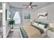 Bedroom with a queen bed and window at 2423 Hyatt Creek Ln, Port Orange, FL 32128