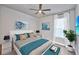 Bedroom with a queen bed and window at 2423 Hyatt Creek Ln, Port Orange, FL 32128