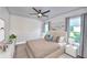 Spacious bedroom with king-size bed and large windows at 2423 Hyatt Creek Ln, Port Orange, FL 32128