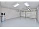 Spacious two-car garage with epoxy floors and automatic openers at 2423 Hyatt Creek Ln, Port Orange, FL 32128