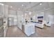 Open concept kitchen features stainless steel appliances and an island at 2423 Hyatt Creek Ln, Port Orange, FL 32128