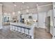Modern kitchen with large island and breakfast bar seating at 2423 Hyatt Creek Ln, Port Orange, FL 32128