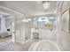 Luxurious bathroom with soaking tub, walk-in shower, and double vanity at 2423 Hyatt Creek Ln, Port Orange, FL 32128