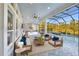 Screened patio with pool, spa, and outdoor kitchen at 2423 Hyatt Creek Ln, Port Orange, FL 32128