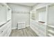 Large walk-in closet with ample shelving and drawers at 2423 Hyatt Creek Ln, Port Orange, FL 32128