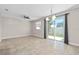 Bright dining room with sliding glass doors leading to backyard at 2741 Pleasant Cypress Cir, Kissimmee, FL 34741