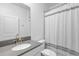 Clean bathroom with single vanity and shower/tub combo at 3087 Camden Way, Davenport, FL 33837
