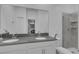 Modern bathroom with double vanity and walk-in shower at 3087 Camden Way, Davenport, FL 33837