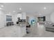 Open concept kitchen with island, stainless steel appliances, and breakfast nook at 3087 Camden Way, Davenport, FL 33837