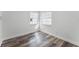 Cozy bedroom with hardwood floors and corner windows at 3303 Helen Ave, Orlando, FL 32804