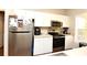 Well-equipped kitchen with stainless steel appliances at 3577 Conroy Rd # 313, Orlando, FL 32839