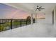 Expansive balcony with views of the surrounding landscape and a ceiling fan for added comfort at 408 Chelsea Ave, Davenport, FL 33837