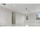 Spacious bedroom featuring an open layout, polished tile floors, and natural light at 408 Chelsea Ave, Davenport, FL 33837