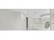 Bright interior with high ceilings, arched doorways, and modern finishes at 408 Chelsea Ave, Davenport, FL 33837