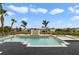 Backyard pool with brick patio, water feature, and lush landscaping at 408 Chelsea Ave, Davenport, FL 33837