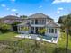 Beautiful two-story home with a private pool, spa, and meticulously maintained landscaping at 408 Chelsea Ave, Davenport, FL 33837