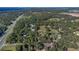 Aerial view showing property's location near highway and water at 4975 Disston Dr, St Cloud, FL 34771