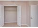 Large bedroom closet with double doors and shelving at 507 Tanoak Ct, Altamonte Springs, FL 32714