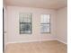 Bedroom with two windows and tiled floor at 507 Tanoak Ct, Altamonte Springs, FL 32714