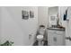 Small bathroom with granite countertop at 6922 Audobon Osprey Cv, Harmony, FL 34773