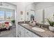 Double vanity bathroom with granite countertop at 6922 Audobon Osprey Cv, Harmony, FL 34773