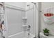 White bathroom with shower/tub combo at 6922 Audobon Osprey Cv, Harmony, FL 34773
