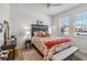 Bedroom with a queen-size bed and a ceiling fan at 6922 Audobon Osprey Cv, Harmony, FL 34773