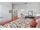 Main bedroom with a large bed and ensuite bathroom at 6922 Audobon Osprey Cv, Harmony, FL 34773